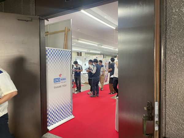 Exhibition entrance with visitors